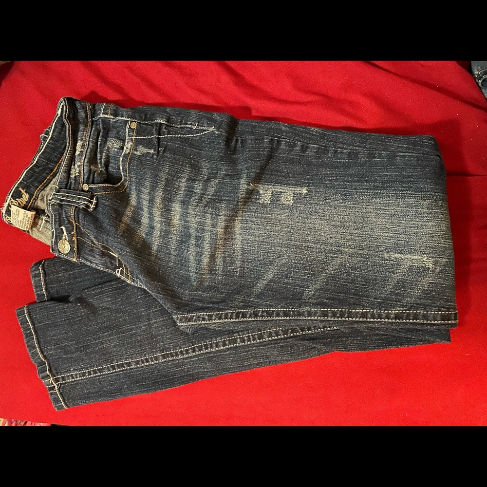Red rivet jeans